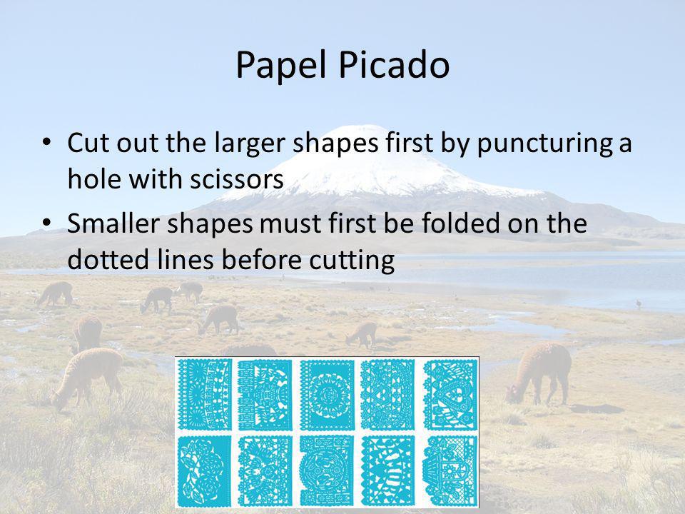 Papel Picado Cut out the larger shapes first by puncturing a hole with scissors.