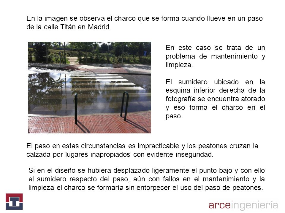 En la imagen se observa el charco que se forma cuando llueve en un paso de la calle Titán en Madrid.