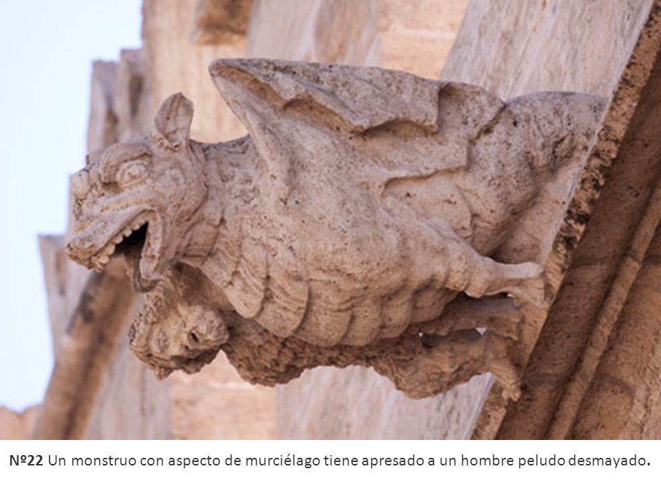 Nº22 Un monstruo con aspecto de murciélago tiene apresado a un hombre peludo desmayado.