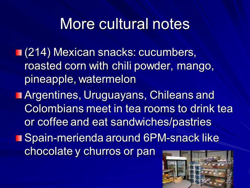 More cultural notes (214) Mexican snacks: cucumbers, roasted corn with chili powder, mango, pineapple, watermelon.