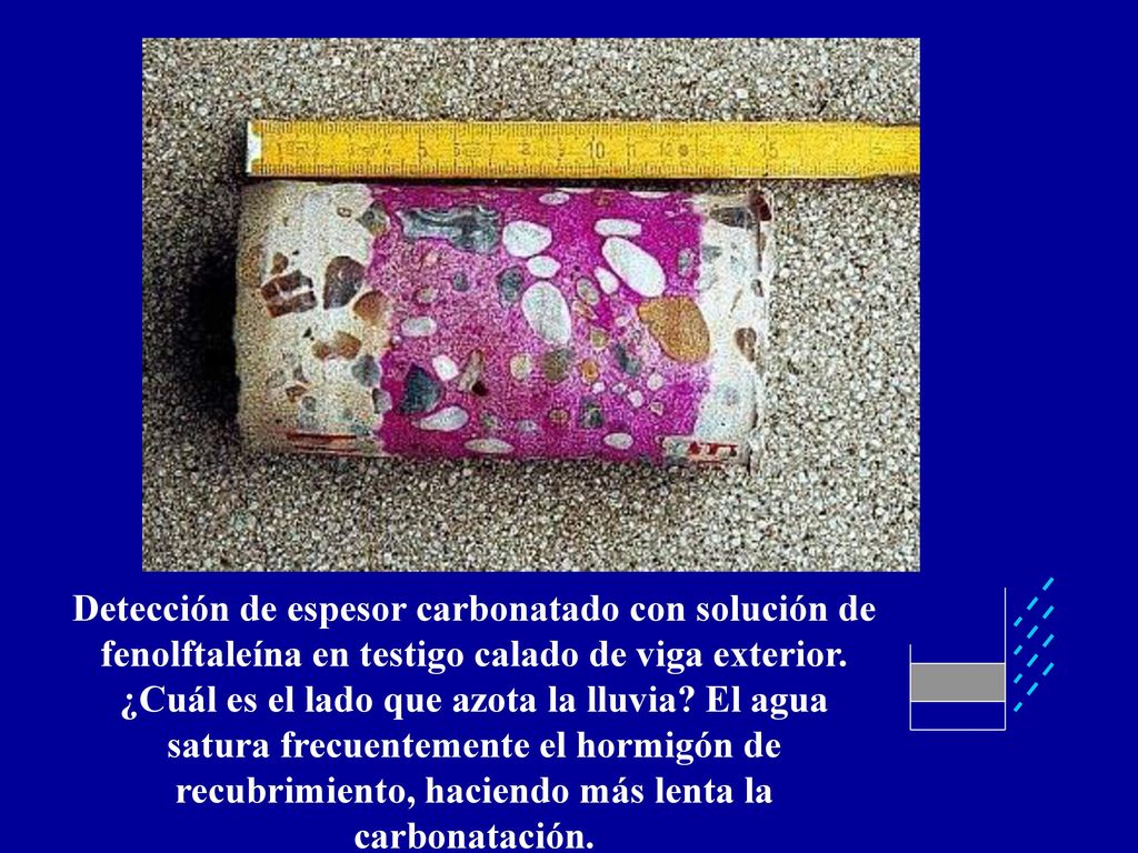 Detección de espesor carbonatado con solución de fenolftaleína en testigo calado de viga exterior.