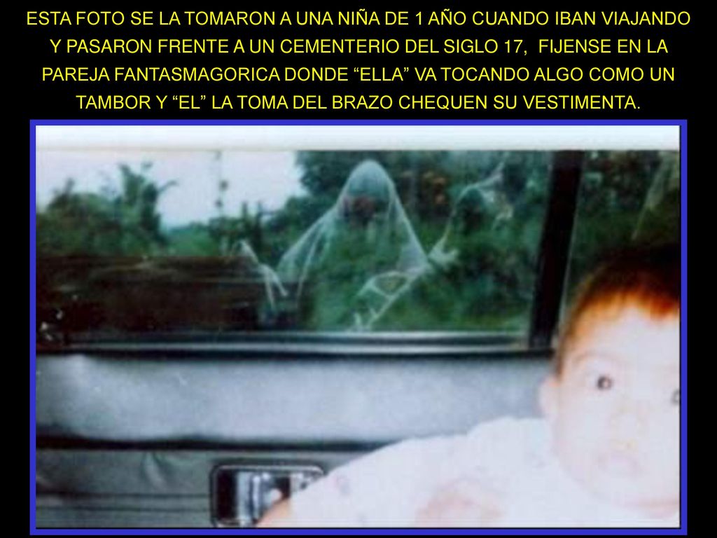 ESTA FOTO SE LA TOMARON A UNA NIÑA DE 1 AÑO CUANDO IBAN VIAJANDO Y PASARON FRENTE A UN CEMENTERIO DEL SIGLO 17, FIJENSE EN LA PAREJA FANTASMAGORICA DONDE ELLA VA TOCANDO ALGO COMO UN TAMBOR Y EL LA TOMA DEL BRAZO CHEQUEN SU VESTIMENTA.