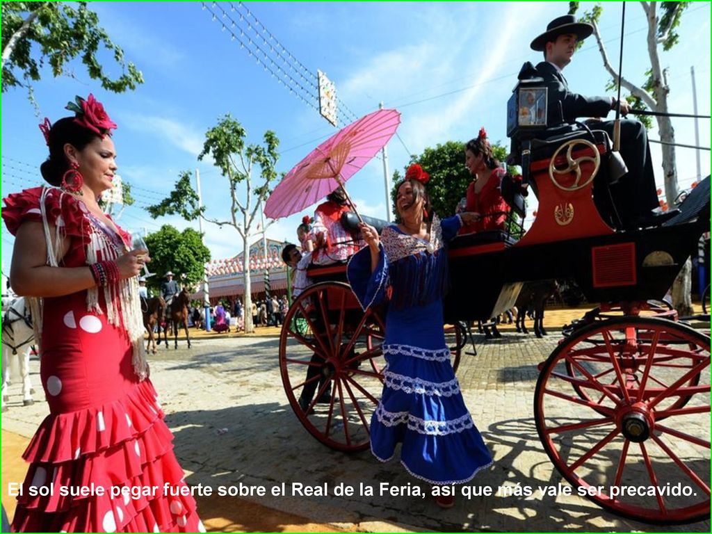 El sol suele pegar fuerte sobre el Real de la Feria, así que más vale ser precavido.