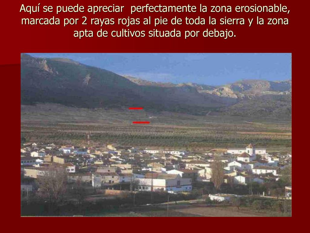 Aquí se puede apreciar perfectamente la zona erosionable, marcada por 2 rayas rojas al pie de toda la sierra y la zona apta de cultivos situada por debajo.
