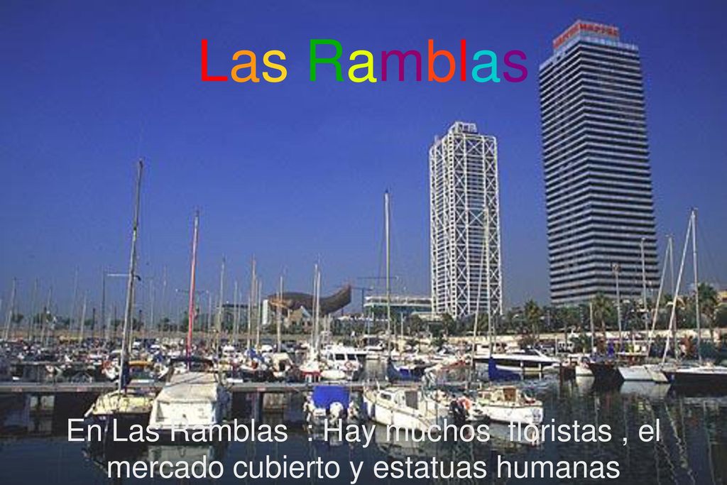 Las Ramblas En Las Ramblas : Hay muchos floristas , el mercado cubierto y estatuas humanas