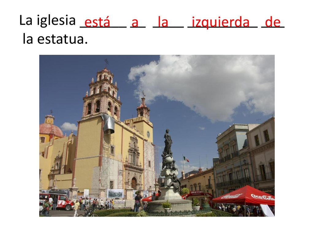 La iglesia ______ __ ____ _________ ___ la estatua.