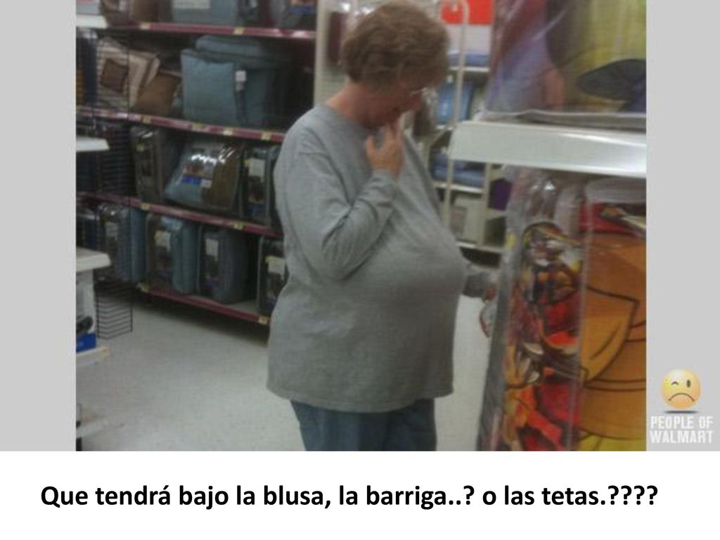 Que tendrá bajo la blusa, la barriga.. o las tetas.