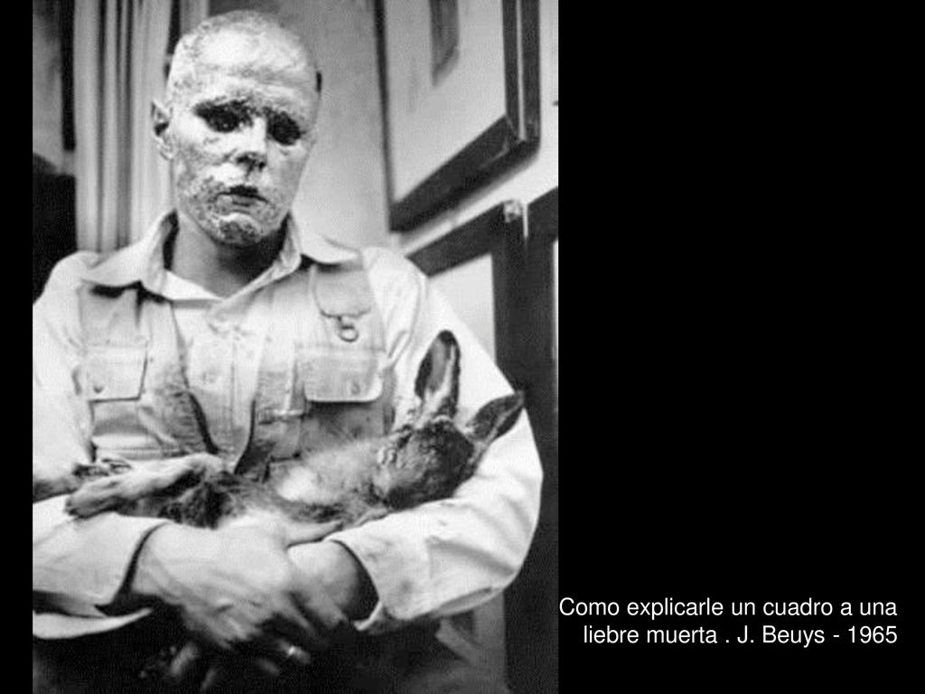 Como explicarle un cuadro a una liebre muerta . J. Beuys