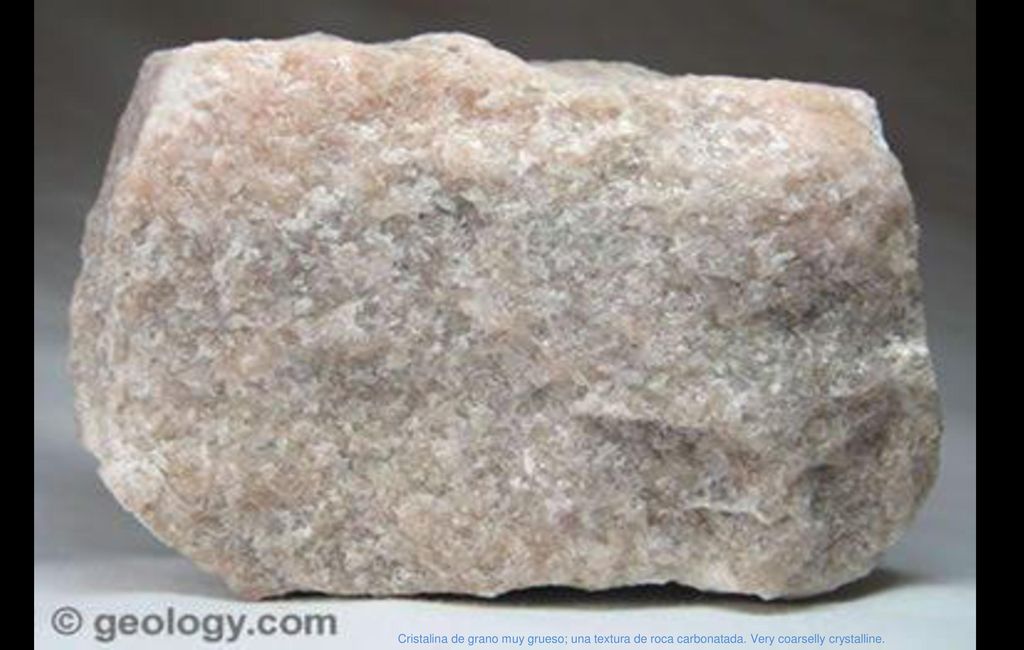Cristalina de grano muy grueso; una textura de roca carbonatada