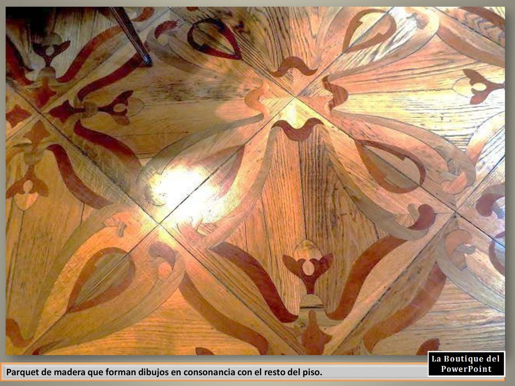 Parquet de madera que forman dibujos en consonancia con el resto del piso.