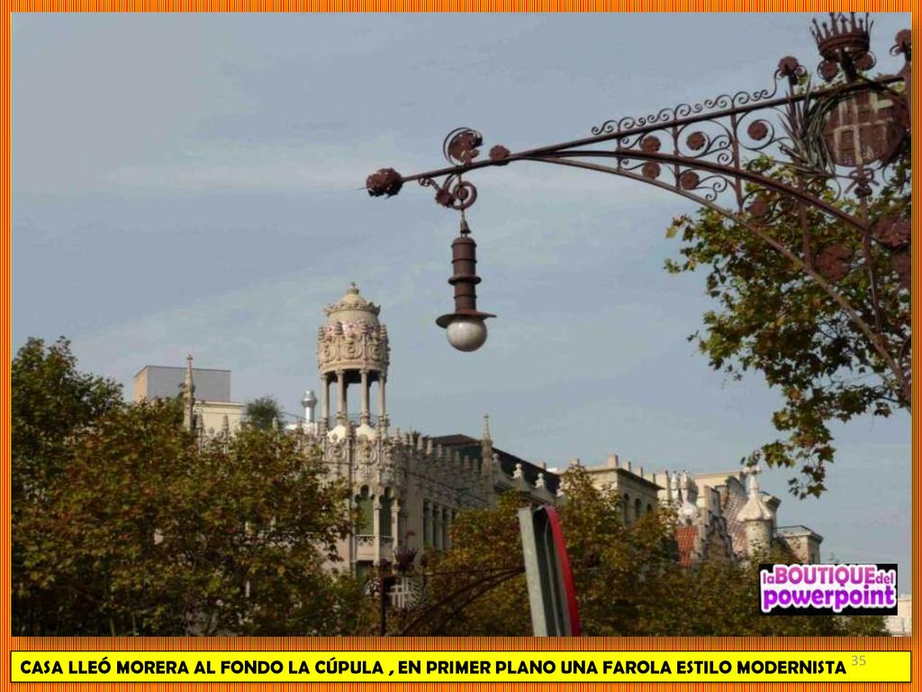 CASA LLEÓ MORERA AL FONDO LA CÚPULA , EN PRIMER PLANO UNA FAROLA ESTILO MODERNISTA