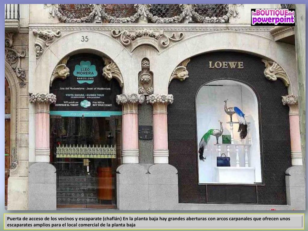 Puerta de acceso de los vecinos y escaparate (chaflán) En la planta baja hay grandes aberturas con arcos carpanales que ofrecen unos escaparates amplios para el local comercial de la planta baja