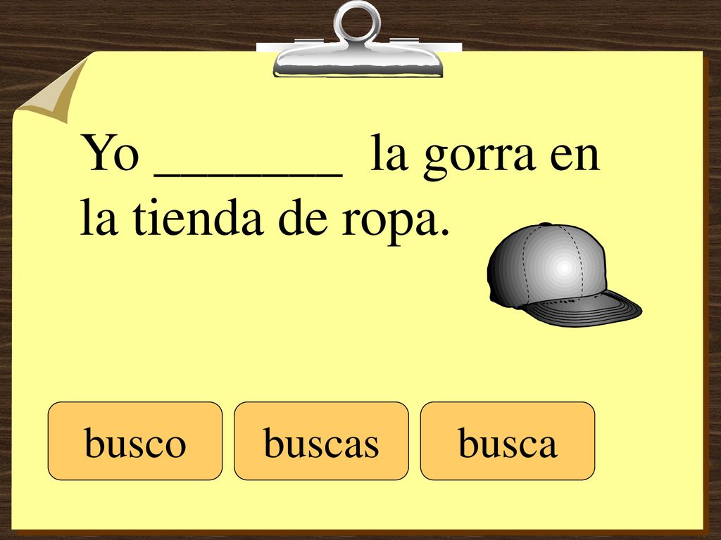 Yo _______ la gorra en la tienda de ropa.