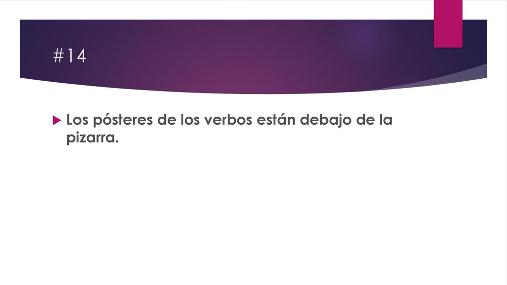 #14 Los pósteres de los verbos están debajo de la pizarra.