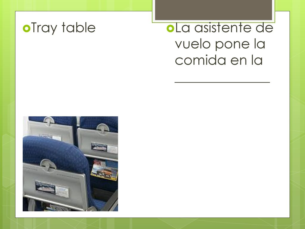 Tray table La asistente de vuelo pone la comida en la ______________