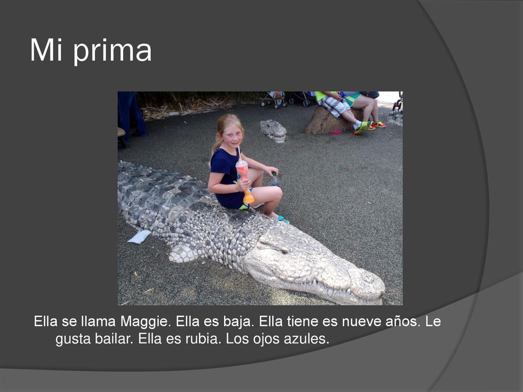 Mi prima Ella se llama Maggie. Ella es baja. Ella tiene es nueve años.