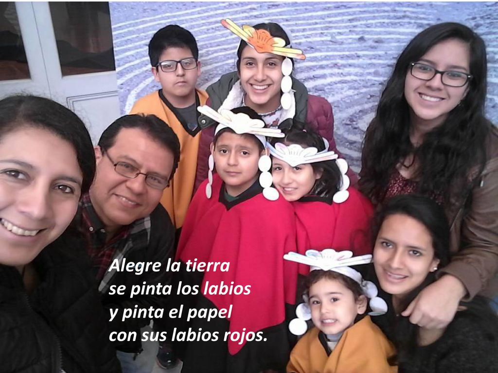 Alegre la tierra se pinta los labios y pinta el papel con sus labios rojos.