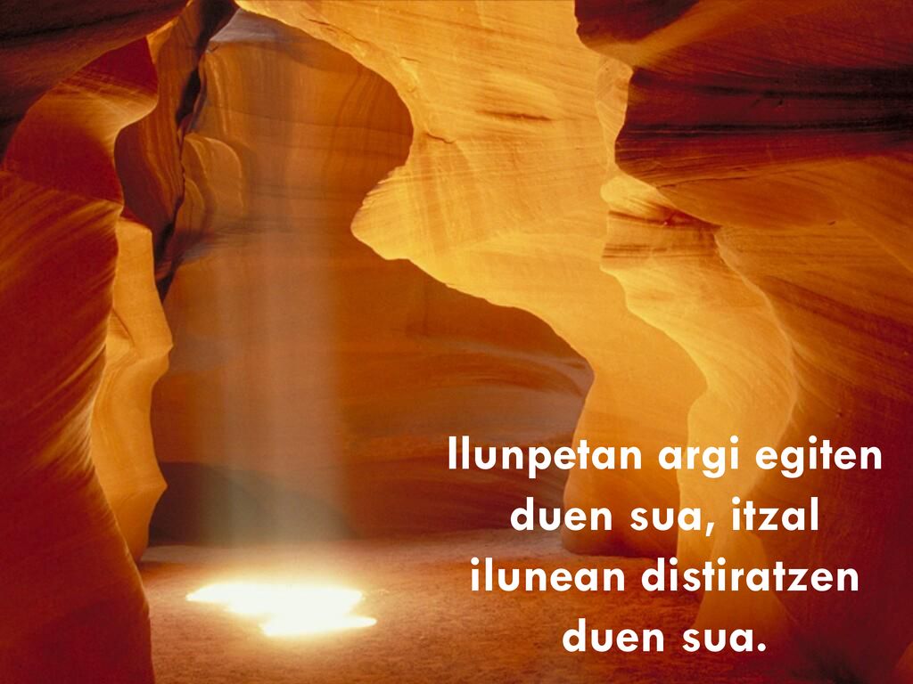 Ilunpetan argi egiten duen sua, itzal ilunean distiratzen duen sua.