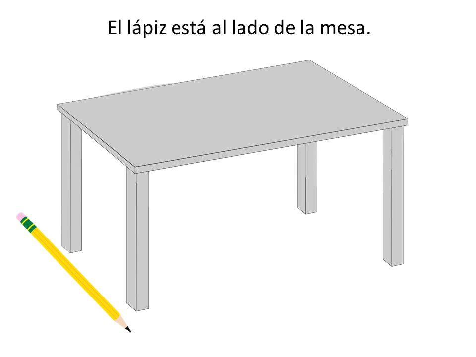 El lápiz está al lado de la mesa.