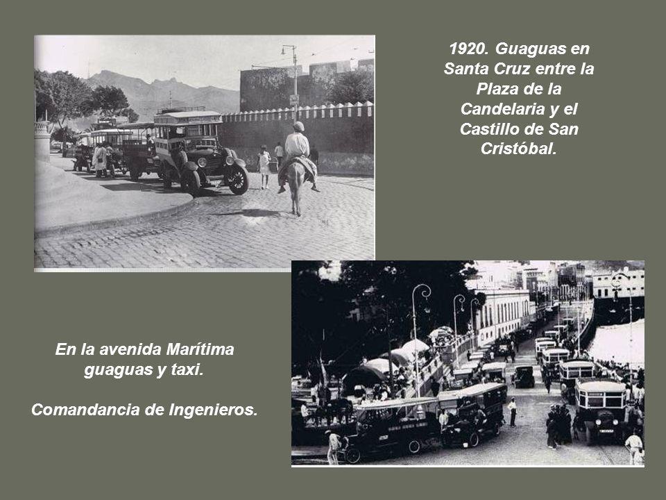 En la avenida Marítima guaguas y taxi. Comandancia de Ingenieros.
