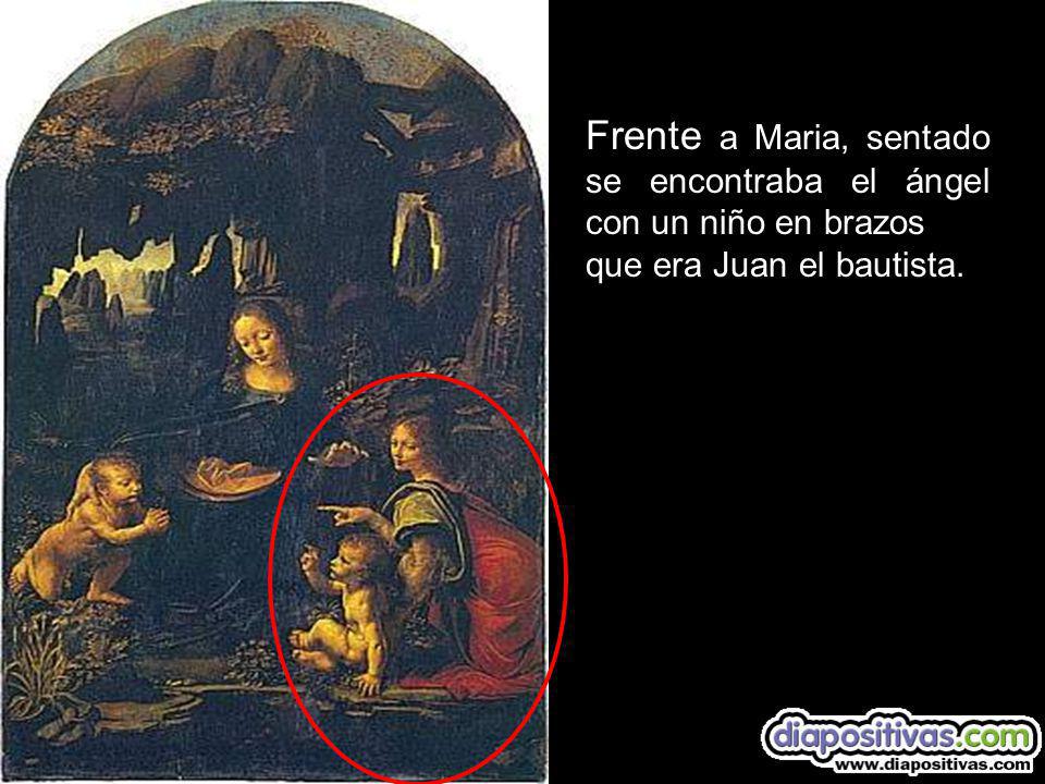 Frente a Maria, sentado se encontraba el ángel con un niño en brazos