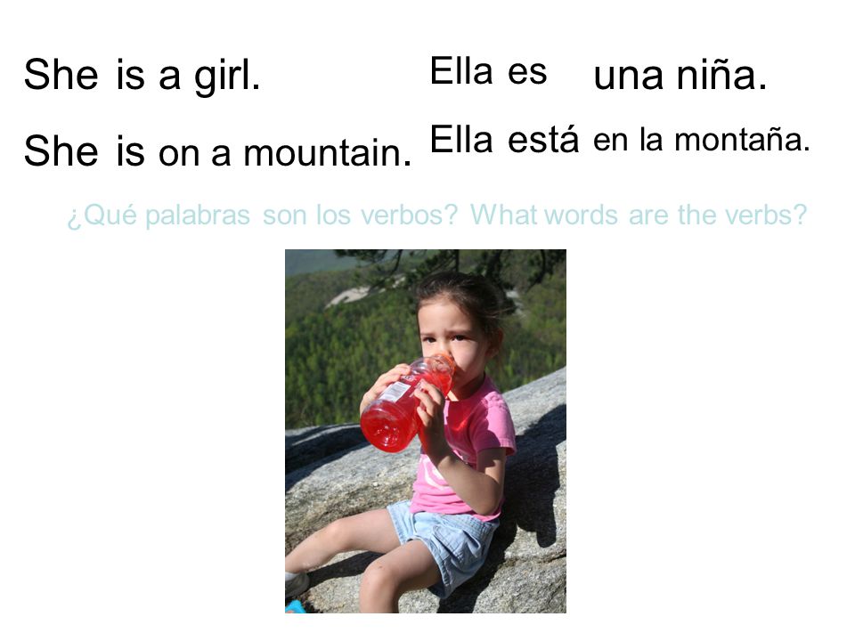 She is a girl. una niña. on a mountain. Ella es está en la montaña.