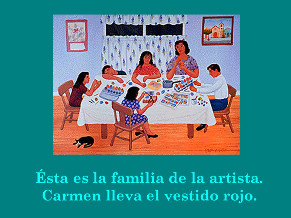 Ésta es la familia de la artista. Carmen lleva el vestido rojo.