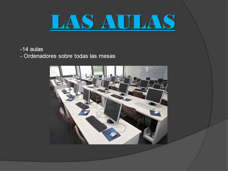 LAS AULAS 14 aulas Ordenadores sobre todas las mesas