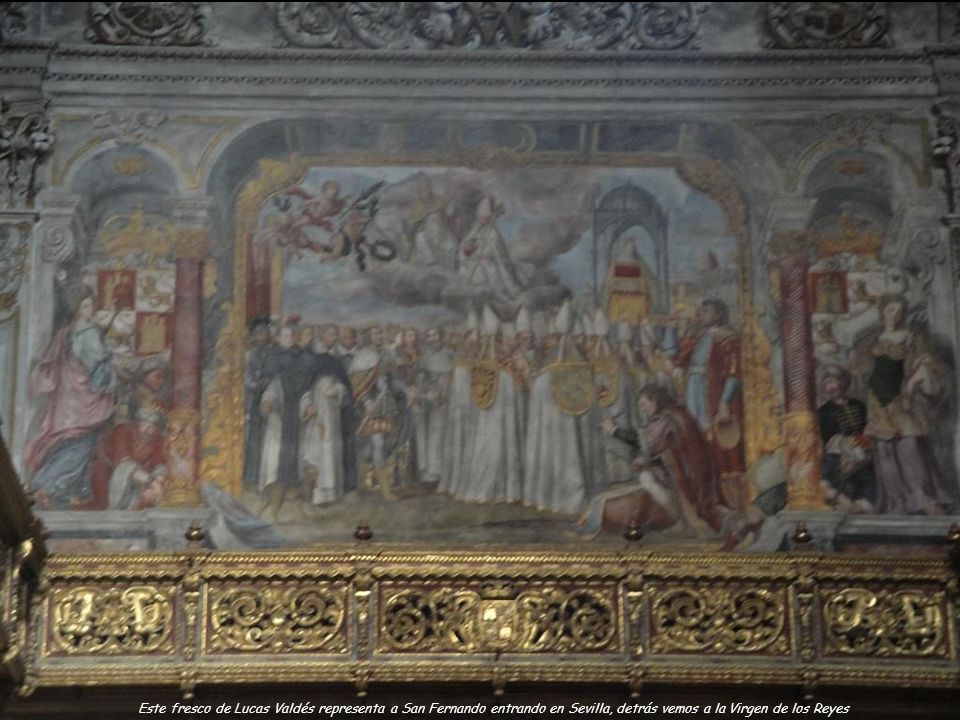Este fresco de Lucas Valdés representa a San Fernando entrando en Sevilla, detrás vemos a la Virgen de los Reyes