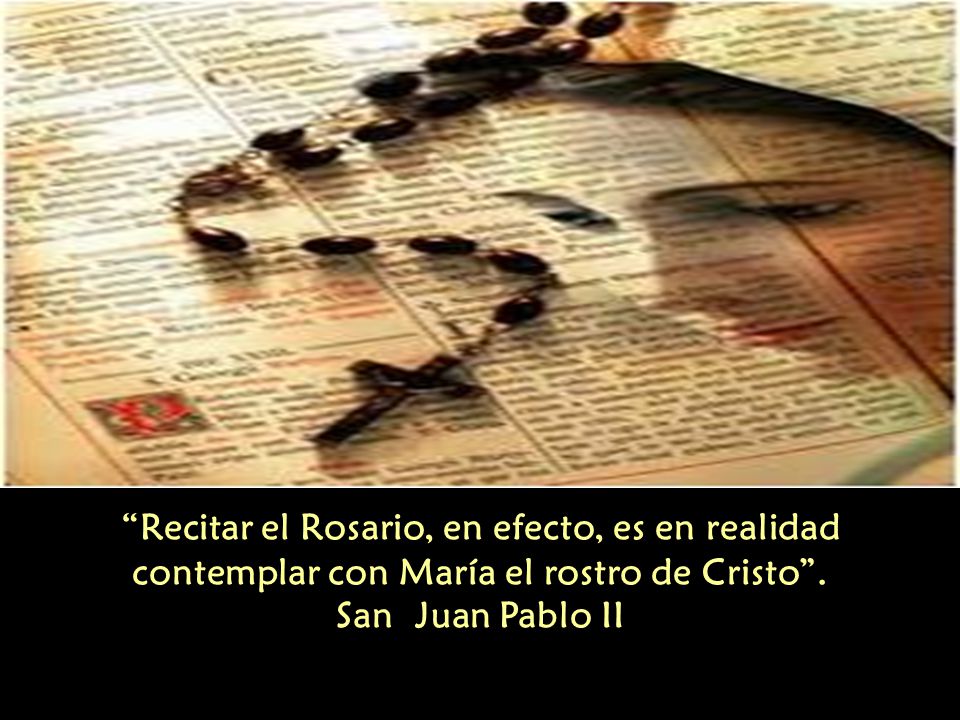 Recitar el Rosario, en efecto, es en realidad contemplar con María el rostro de Cristo .