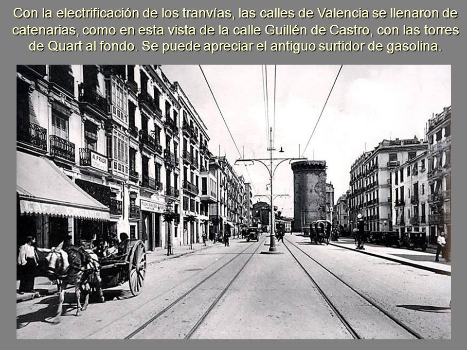 Con la electrificación de los tranvías, las calles de Valencia se llenaron de catenarias, como en esta vista de la calle Guillén de Castro, con las torres de Quart al fondo.