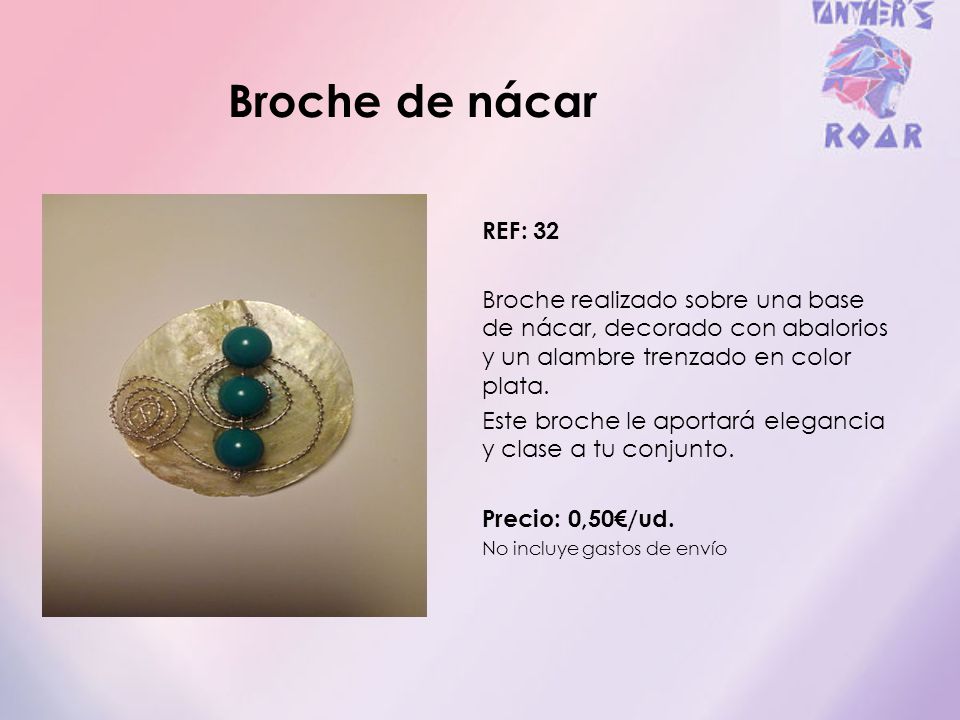 Broche de nácar REF: 32. Broche realizado sobre una base de nácar, decorado con abalorios y un alambre trenzado en color plata.