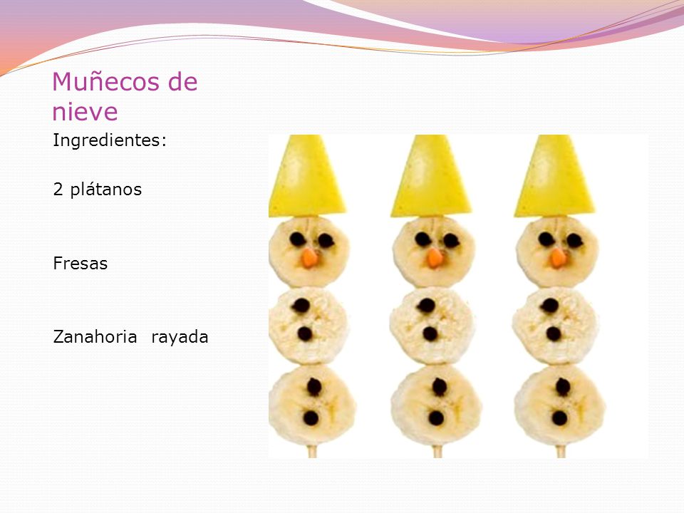 Muñecos de nieve Ingredientes: 2 plátanos Fresas Zanahoria rayada