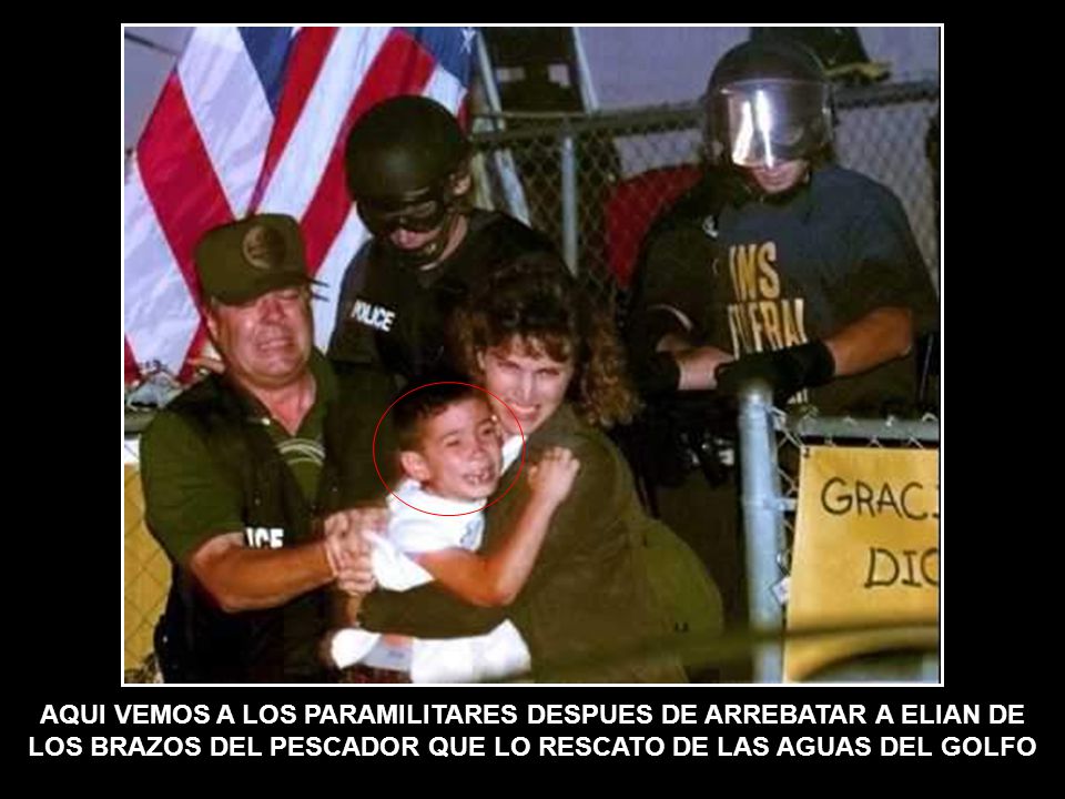 AQUI VEMOS A LOS PARAMILITARES DESPUES DE ARREBATAR A ELIAN DE LOS BRAZOS DEL PESCADOR QUE LO RESCATO DE LAS AGUAS DEL GOLFO