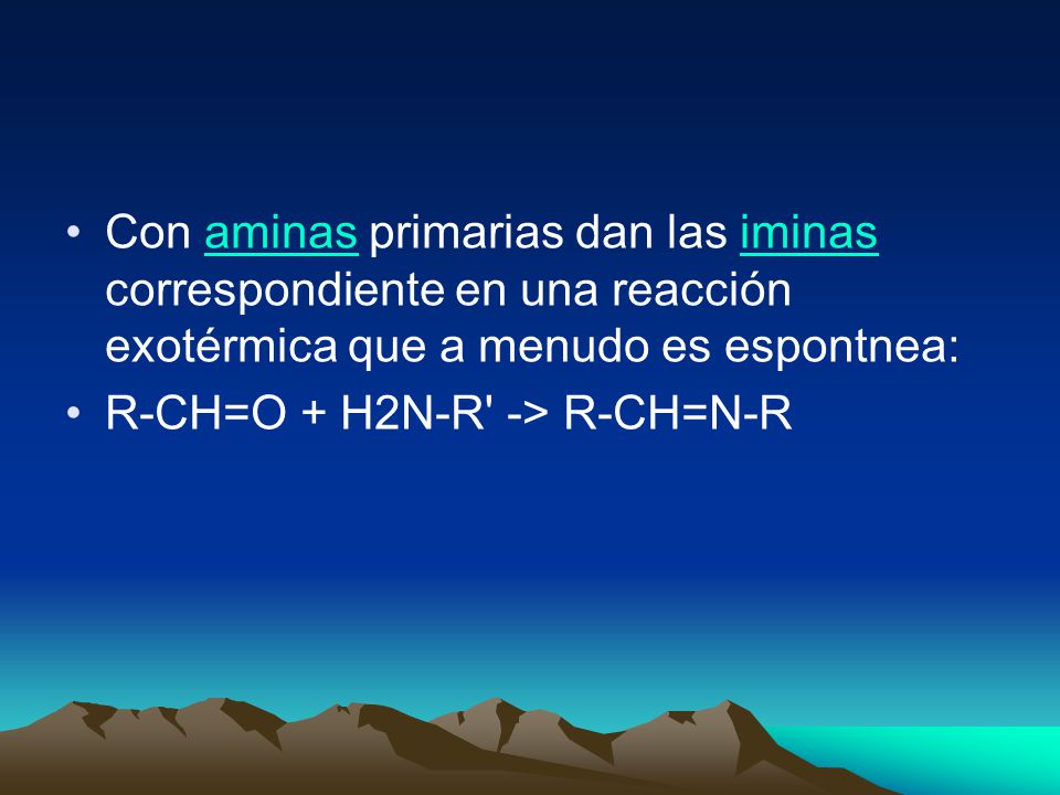 Con aminas primarias dan las iminas correspondiente en una reacción exotérmica que a menudo es espontnea: