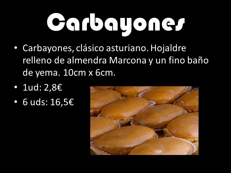 Carbayones Carbayones, clásico asturiano. Hojaldre relleno de almendra Marcona y un fino baño de yema. 10cm x 6cm.