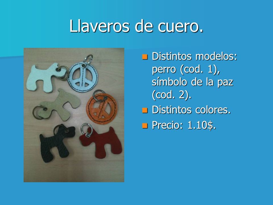 Llaveros de cuero. Distintos modelos: perro (cod. 1), símbolo de la paz (cod. 2). Distintos colores.