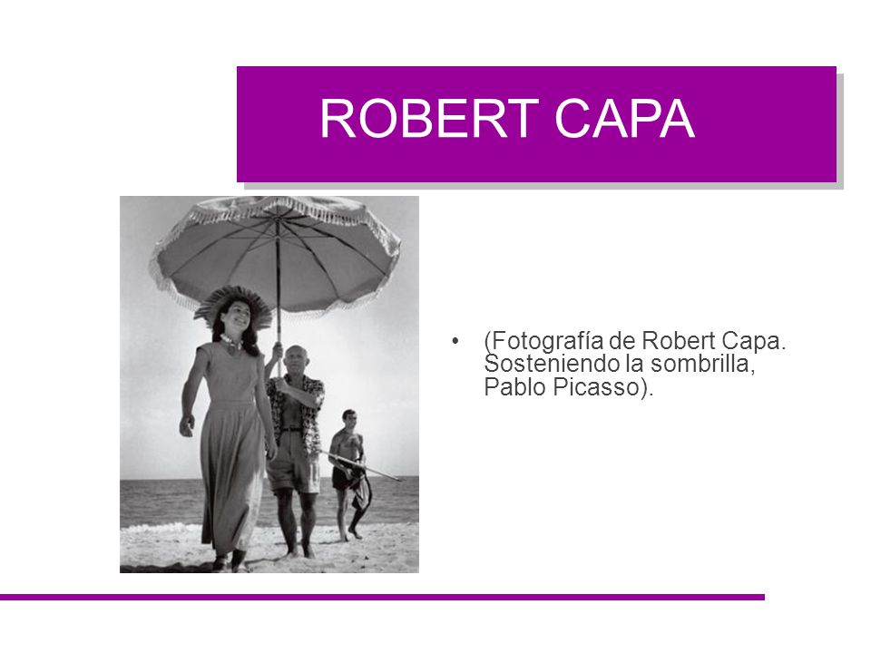 ROBERT CAPA (Fotografía de Robert Capa. Sosteniendo la sombrilla, Pablo Picasso).