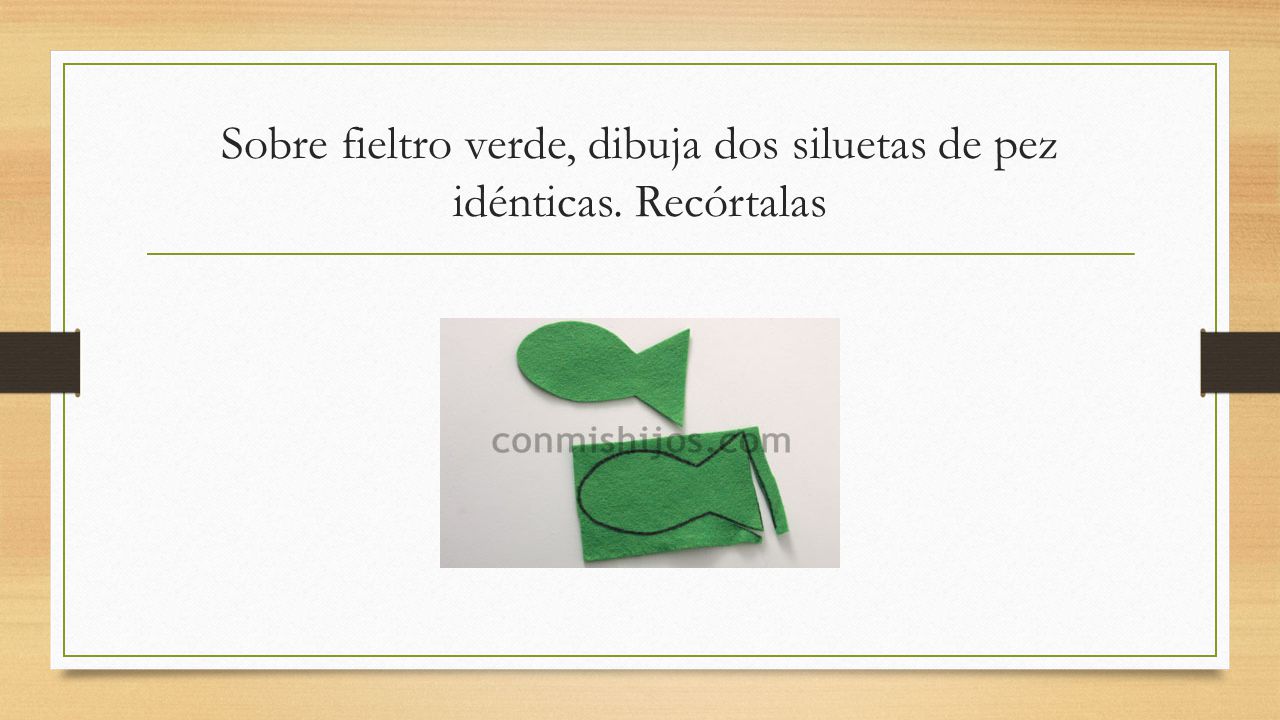 Sobre fieltro verde, dibuja dos siluetas de pez idénticas. Recórtalas
