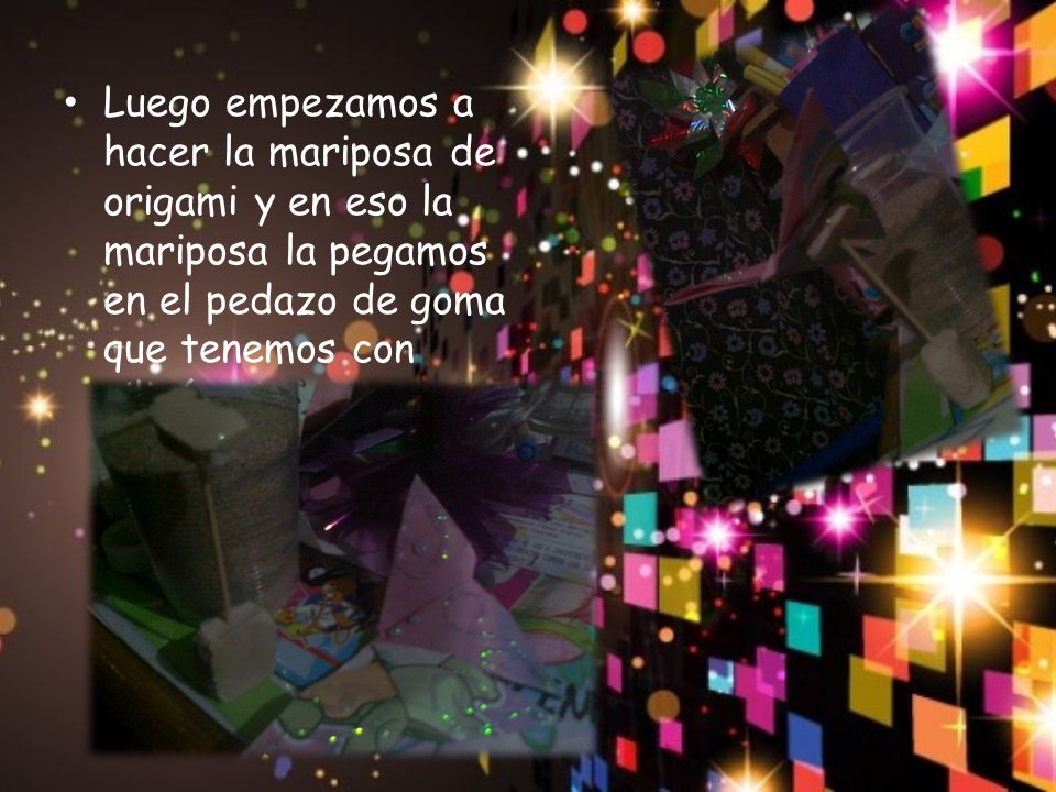 Luego empezamos a hacer la mariposa de origami y en eso la mariposa la pegamos en el pedazo de goma que tenemos con silicón