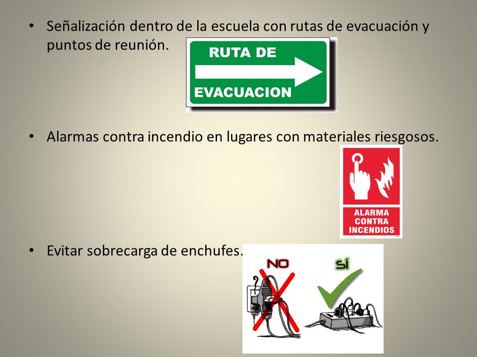 Señalización dentro de la escuela con rutas de evacuación y puntos de reunión.
