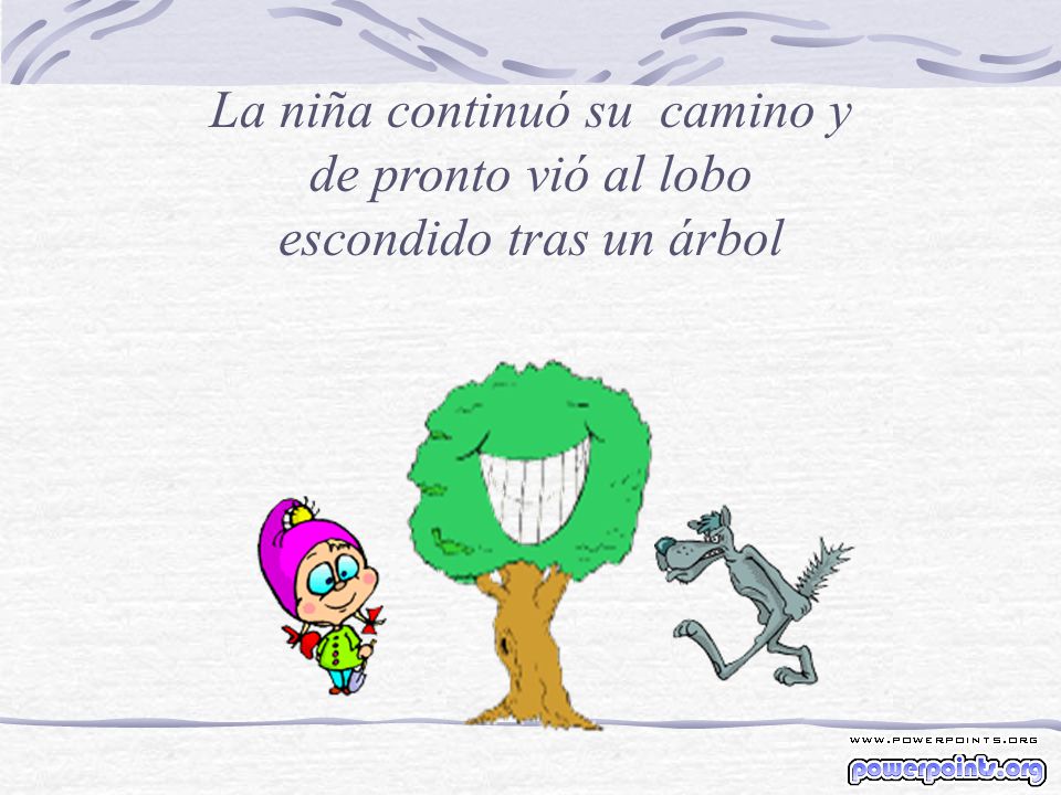 La niña continuó su camino y de pronto vió al lobo escondido tras un árbol