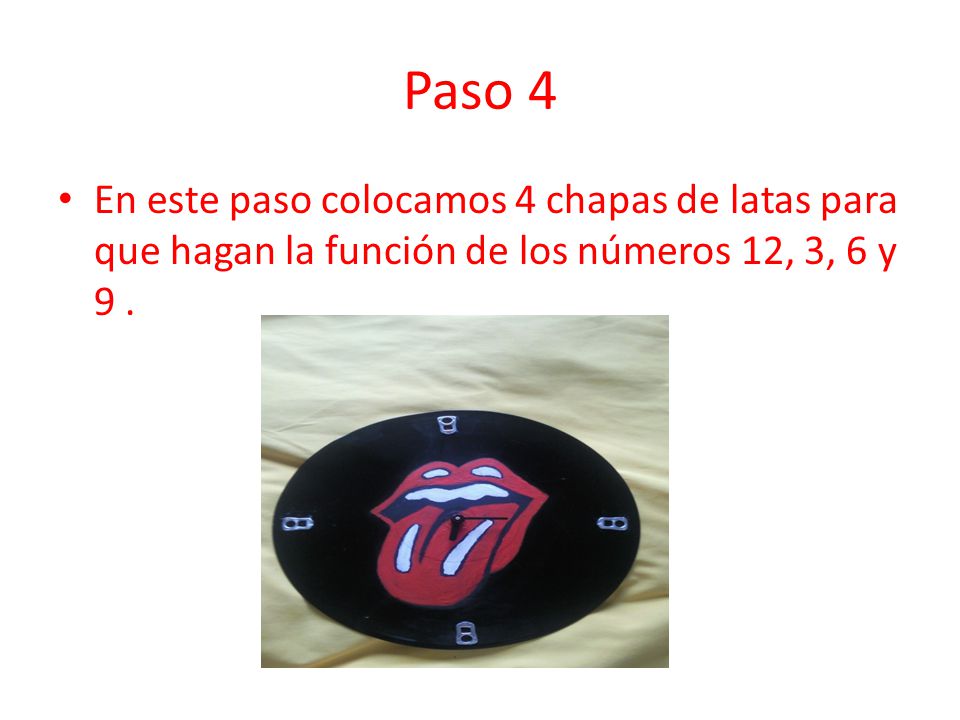 Paso 4 En este paso colocamos 4 chapas de latas para que hagan la función de los números 12, 3, 6 y 9 .