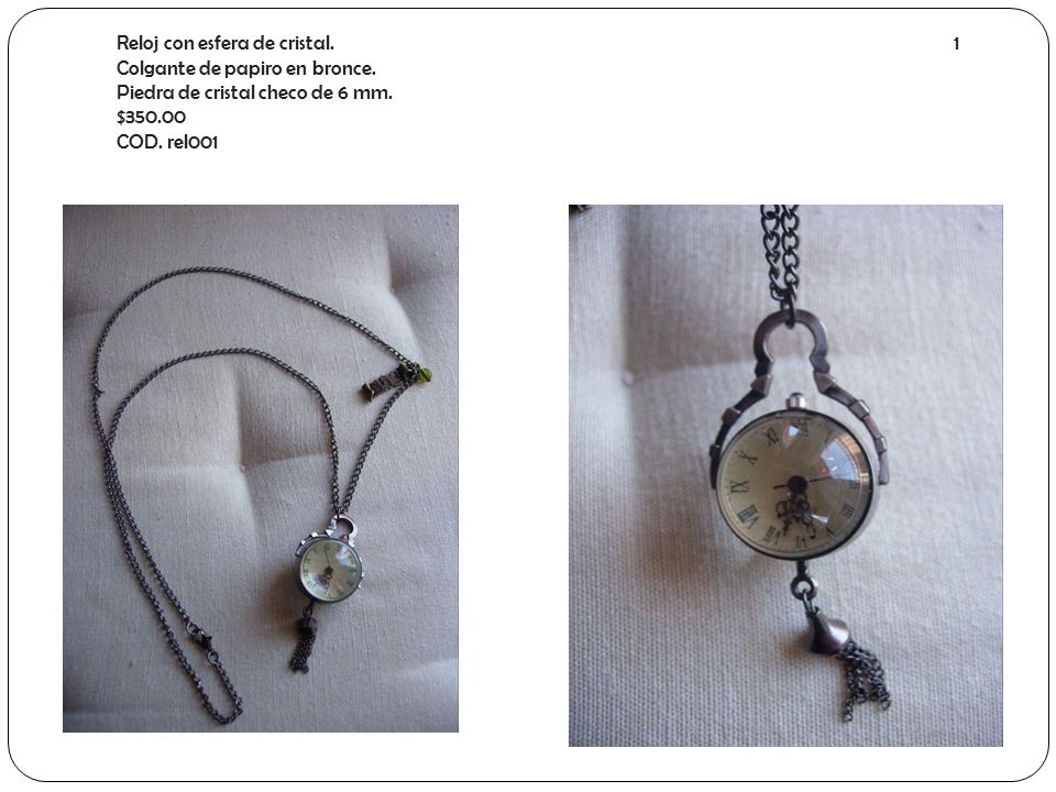 Reloj con esfera de cristal. 1 Colgante de papiro en bronce